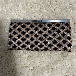 BEBE small clutch bag black and gold